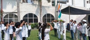 A group of NSUI leaders, including Rishabh Pandey and Rajeshwar Singh Patel, stand together at the flag-hoisting ceremony for the Bunyad Leadership Training Camp at Hotel Varuna, Varanasi, on June 9, 2025.